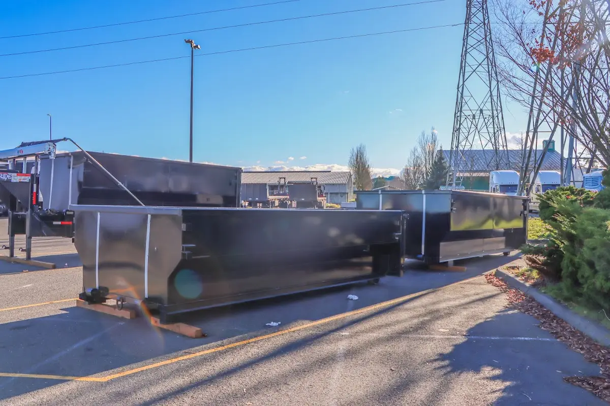 Roll-off dumpster ready for waste disposal at job site for Demolition Dumpster Rental in Blooming Grove